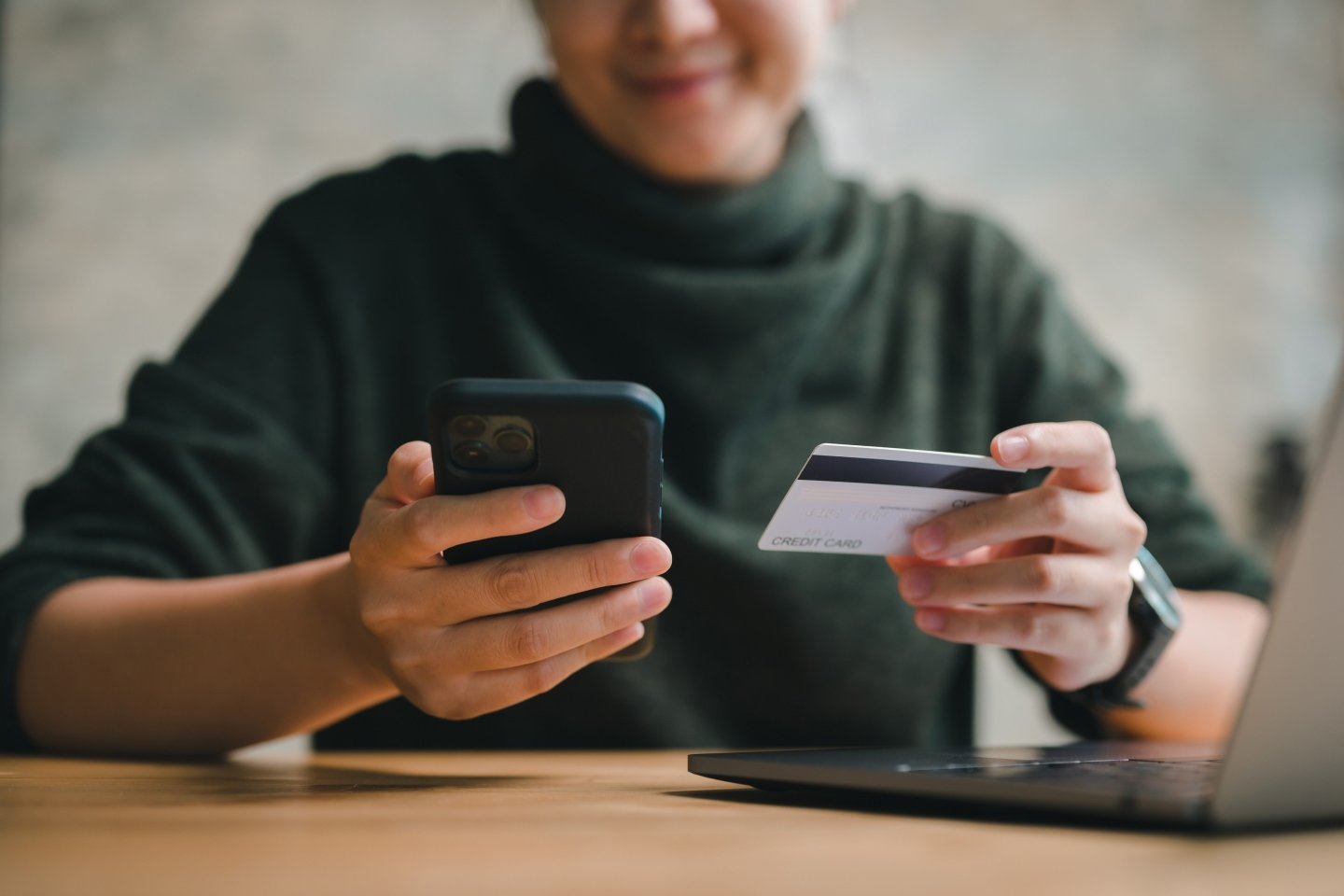 Person doing their banking on a smartphone to represent financial technology